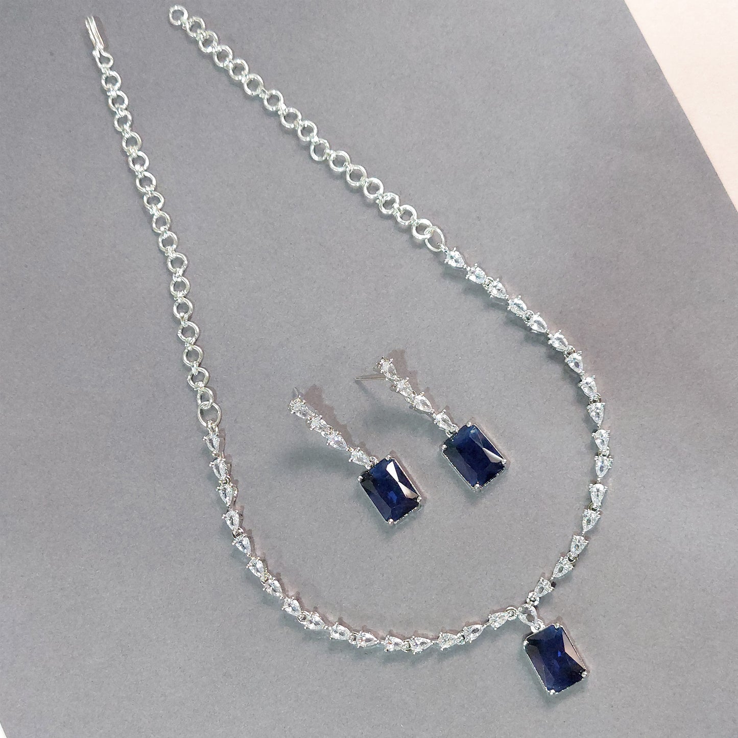 Rhodium Plated Silver Toned Royal Blue American Diamond Studded Necklace with Earring Jewellery Set