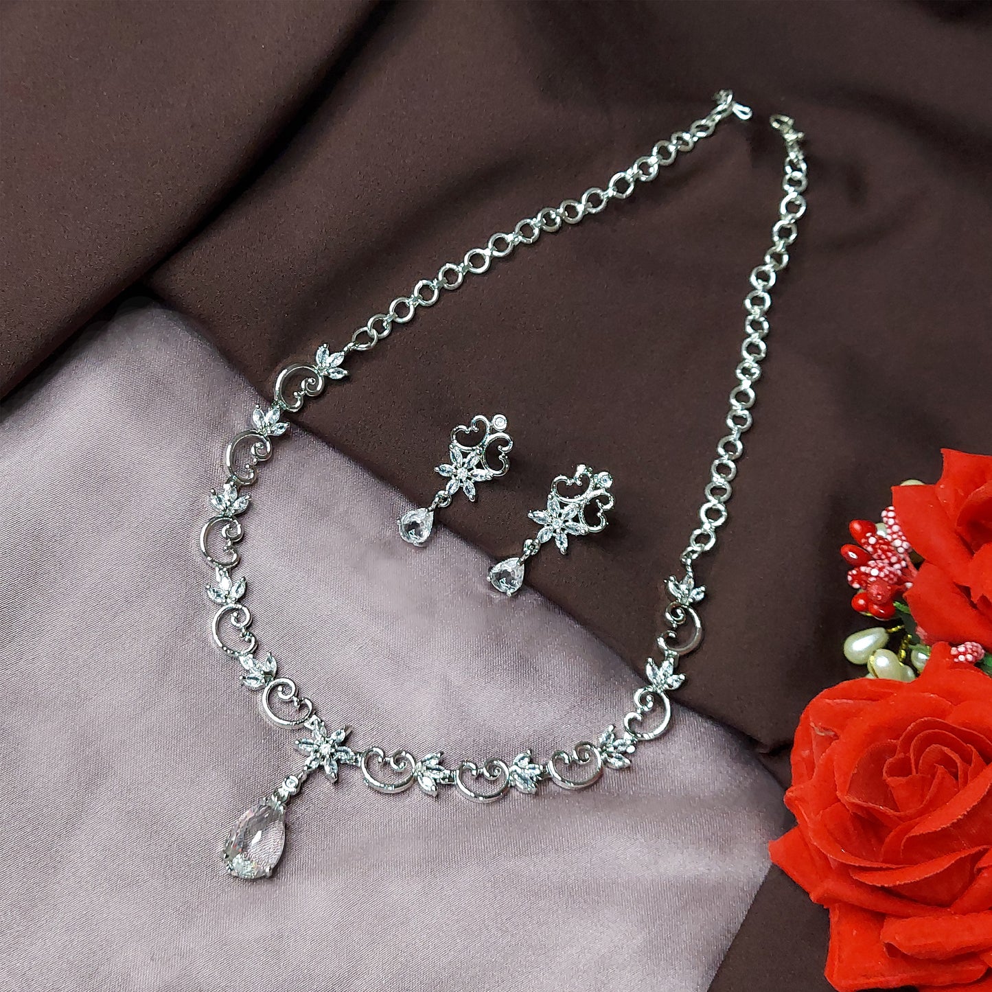 Rhodium Plated Silver Toned Heart Shaped American Diamond Studded Necklace with Earring Jewellery Set