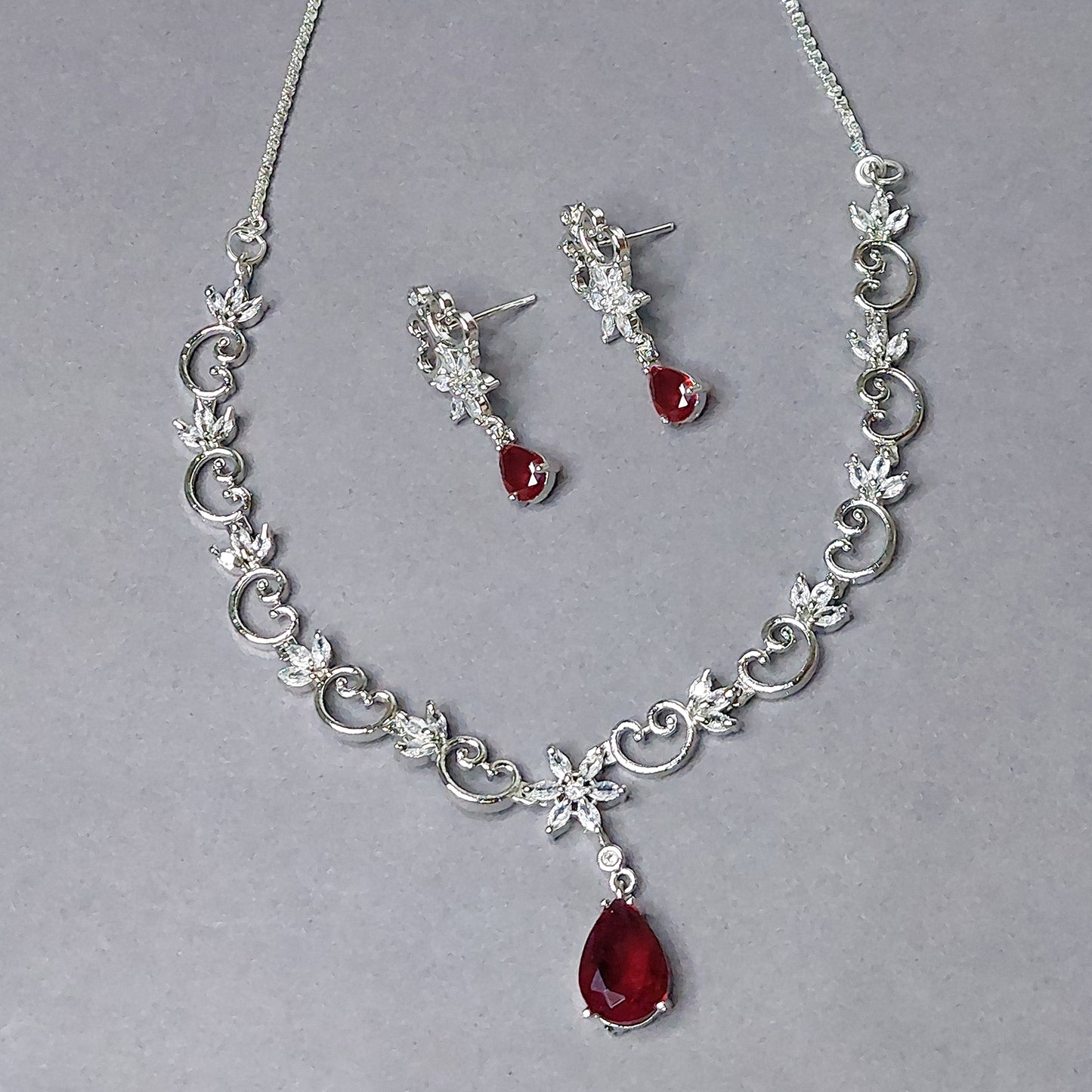 Rhodium Plated Silver Toned Heart Shaped American Diamond Studded Necklace with Earring Jewellery Set