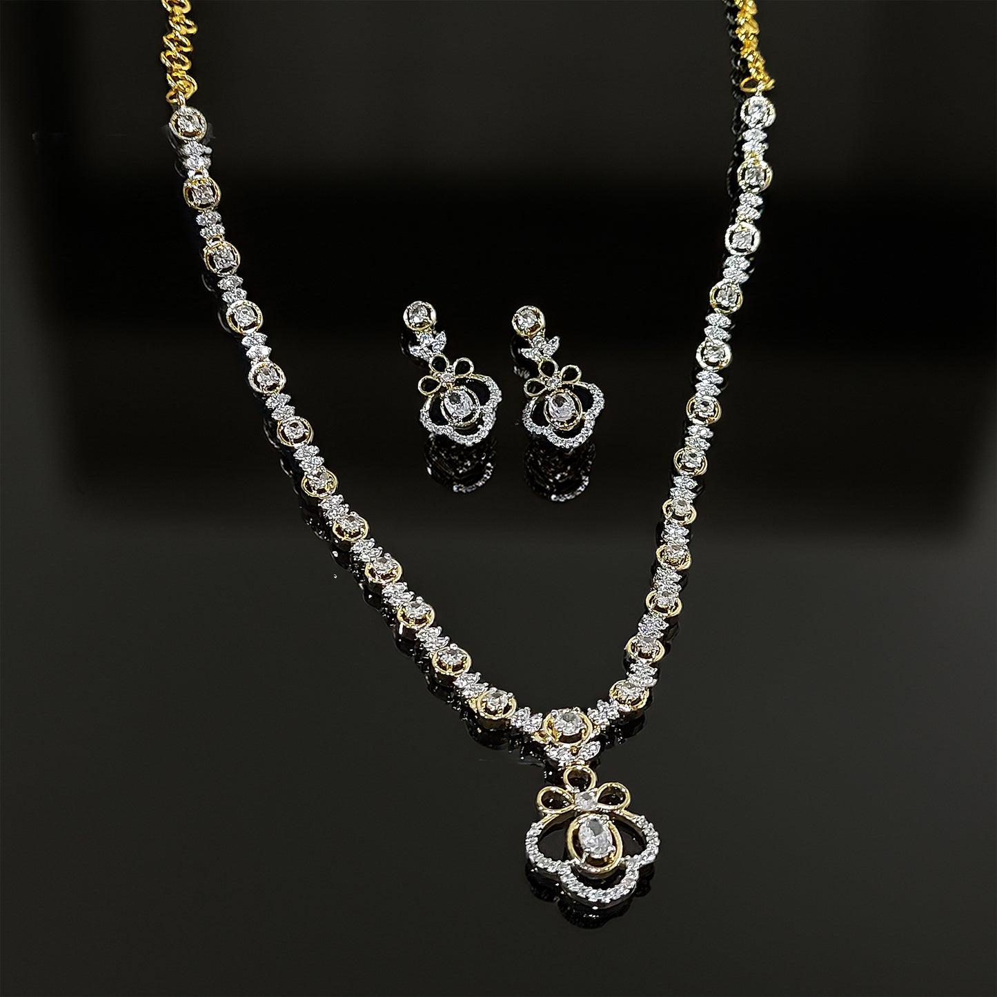 Gold Plated Elegant American Diamond Studded Floral Pendant Necklace with Earring Jewellery Set