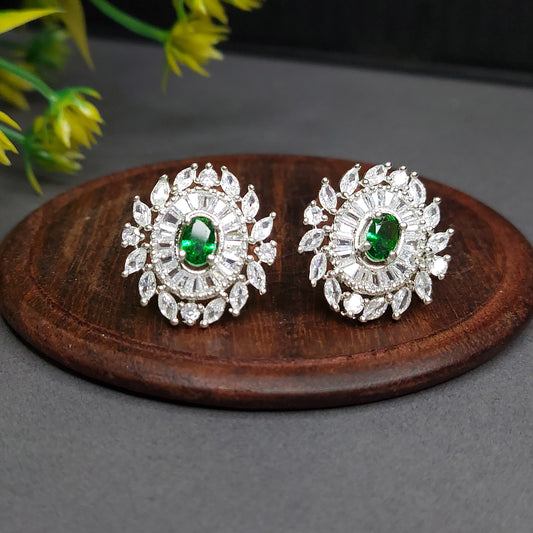 Emerald Green Rhodium Plated American Diamond Dazzling Oval Shaped Stud Earrings