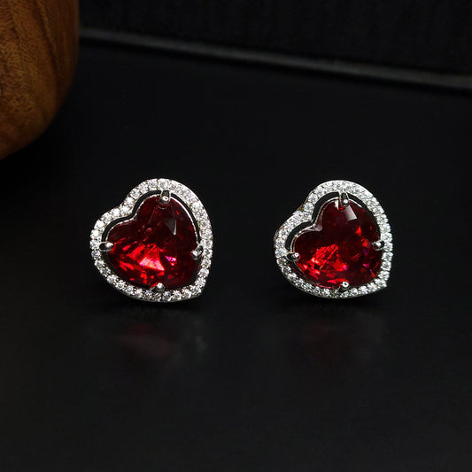 Ruby Red Rhodium Plated American Diamond Dazzling Heart Shaped Stud Earrings