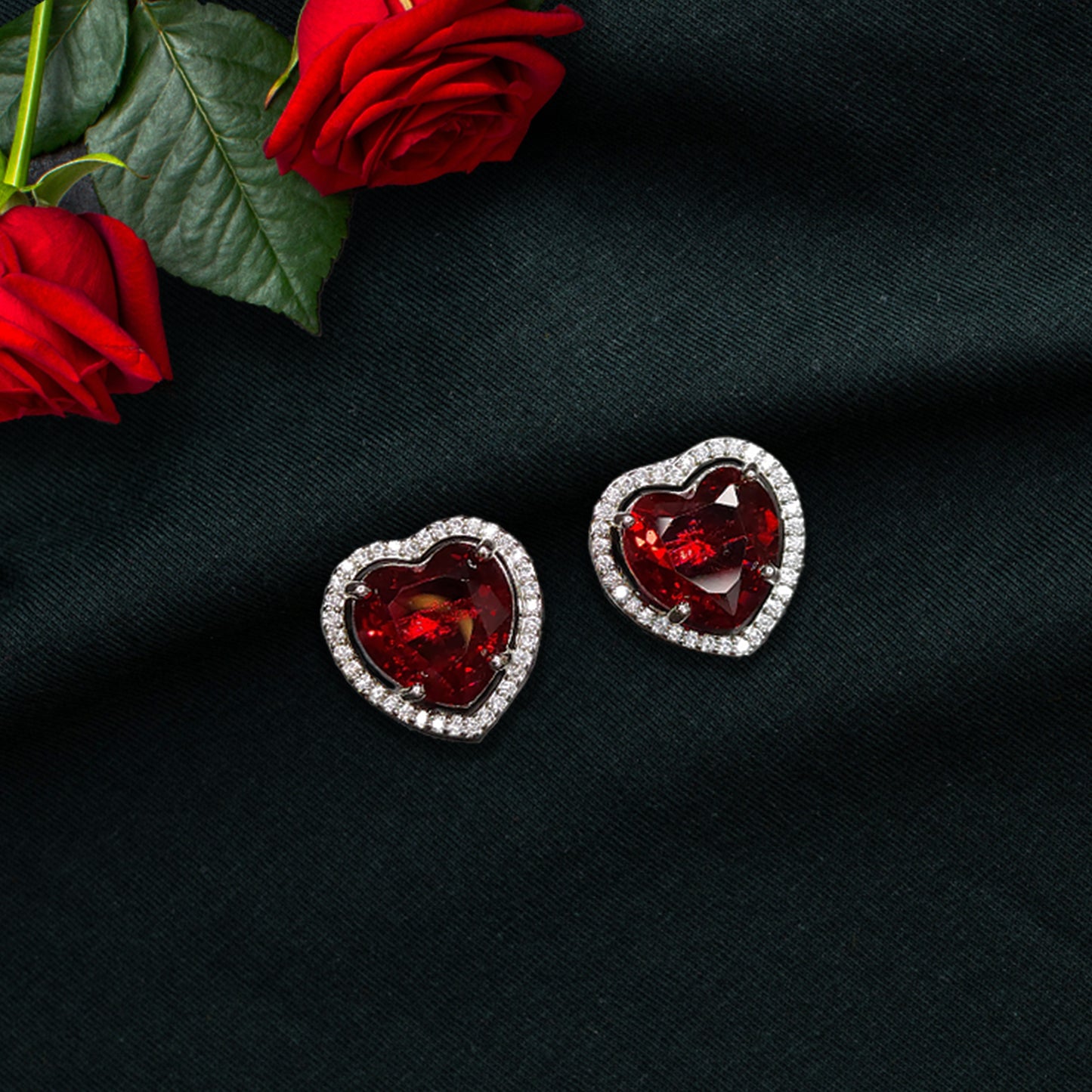 Ruby Red Rhodium Plated American Diamond Dazzling Heart Shaped Stud Earrings