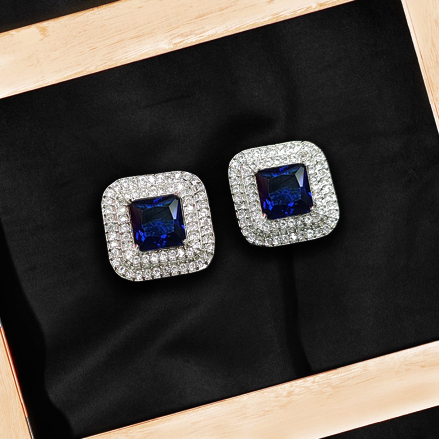 Rhodium Plated Cubic American Diamond Royal Blue Studded Shimmery Stud Earrings